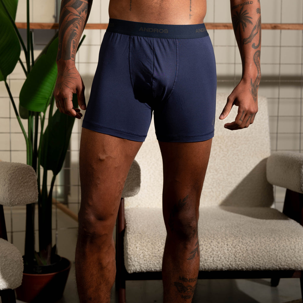 Andros Foundation in Deepsea worn by slim build model.