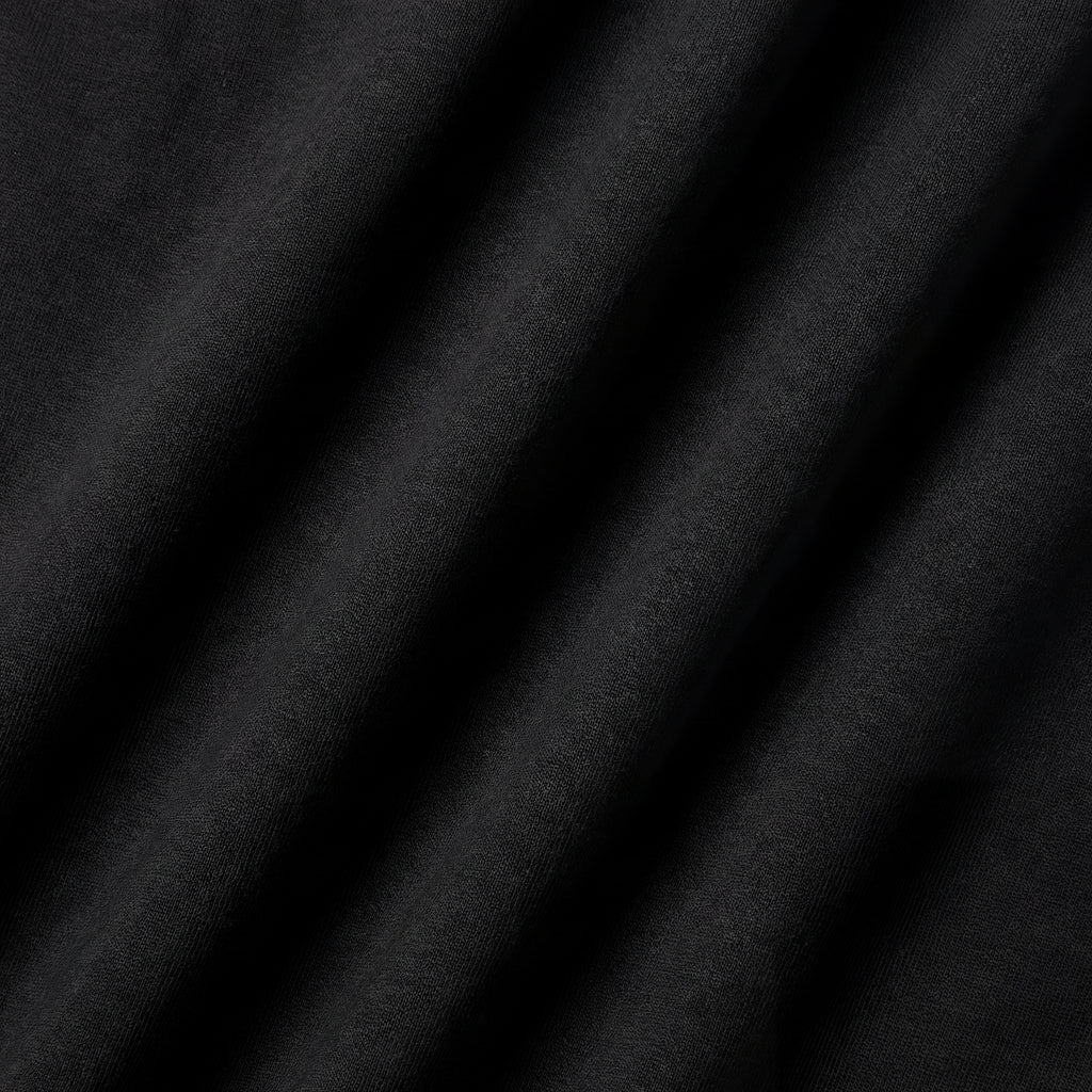 Close-up fabric detail of Andros Foundation in Noir.